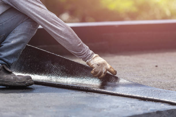 Professional Waterproofing technician working in Madison, NC